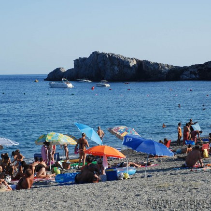 People enjoying the Marina del Este beach